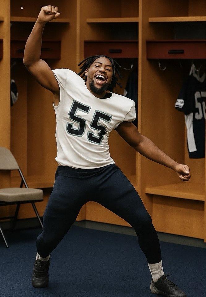 Athlete dancing in locker room with pants and dreadlocks
